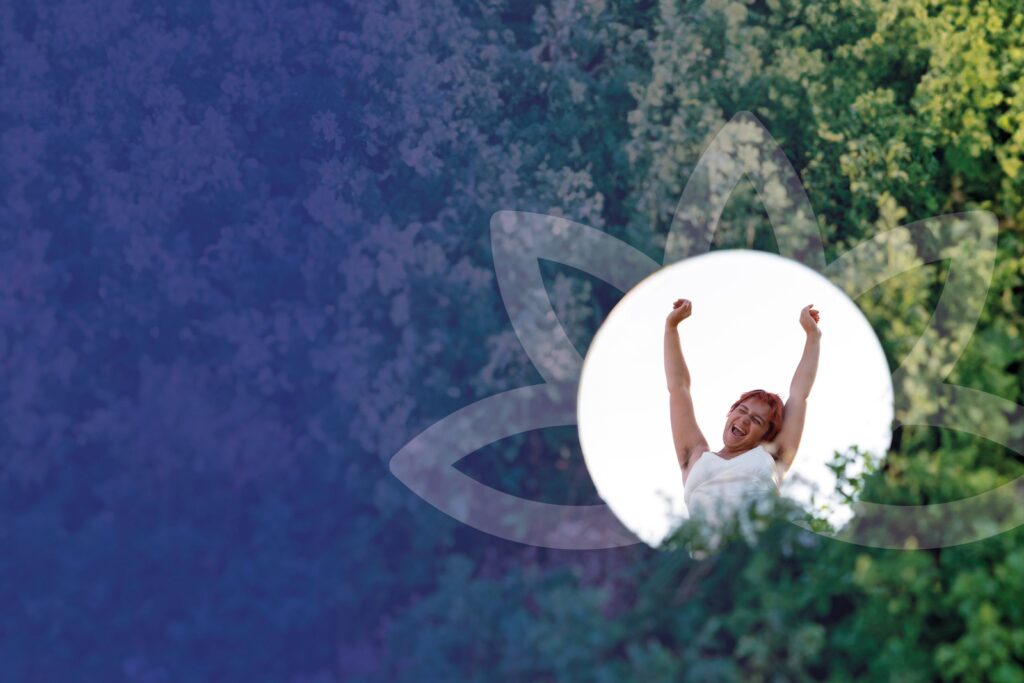 An edited photo of a woman stretching in a white circle. The circle is sitting on top of a green wildlife background.